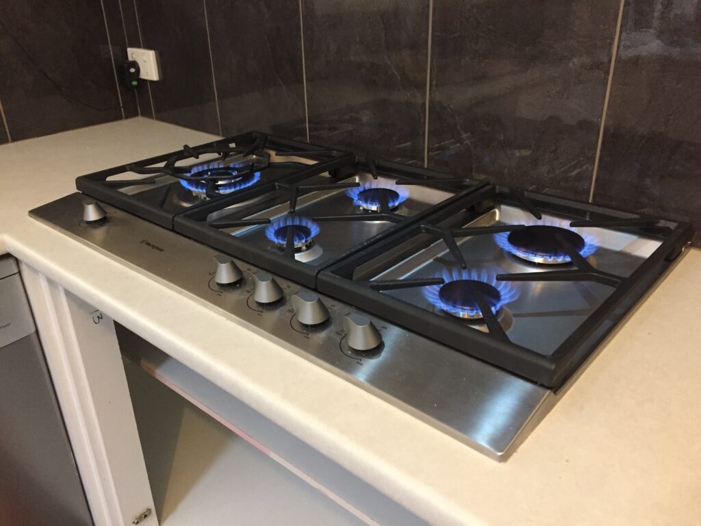 gas hot plates gas burners lit with flame